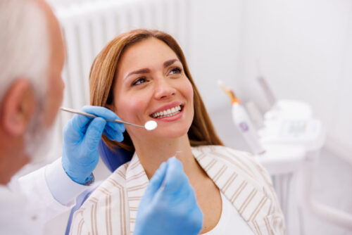 Woman having dental checkup at dentist office